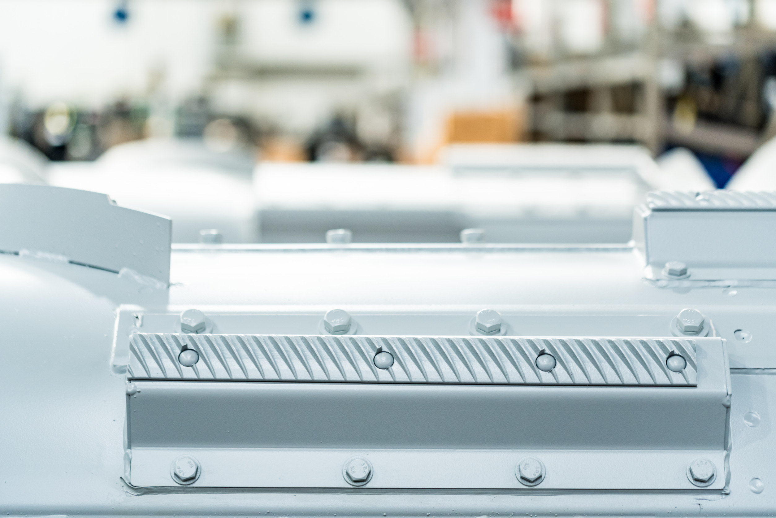 Assembly room at big industrial plant manufacturing tractors and harvesters